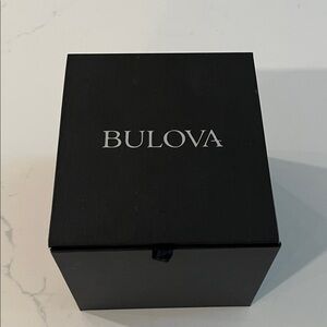 Woman’s Gold and Silver Bulova Watch